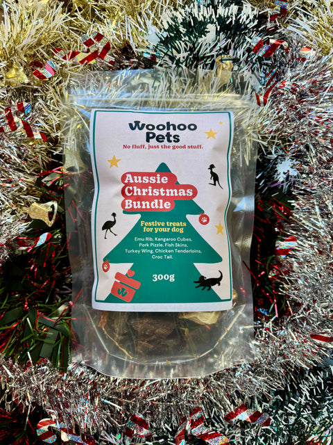 Woohoo Pets Aussie Christmas Bundle package on a festive background with tinsel and decorations.