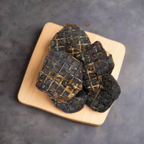 Kangaroo kidney dog treats on chopping board